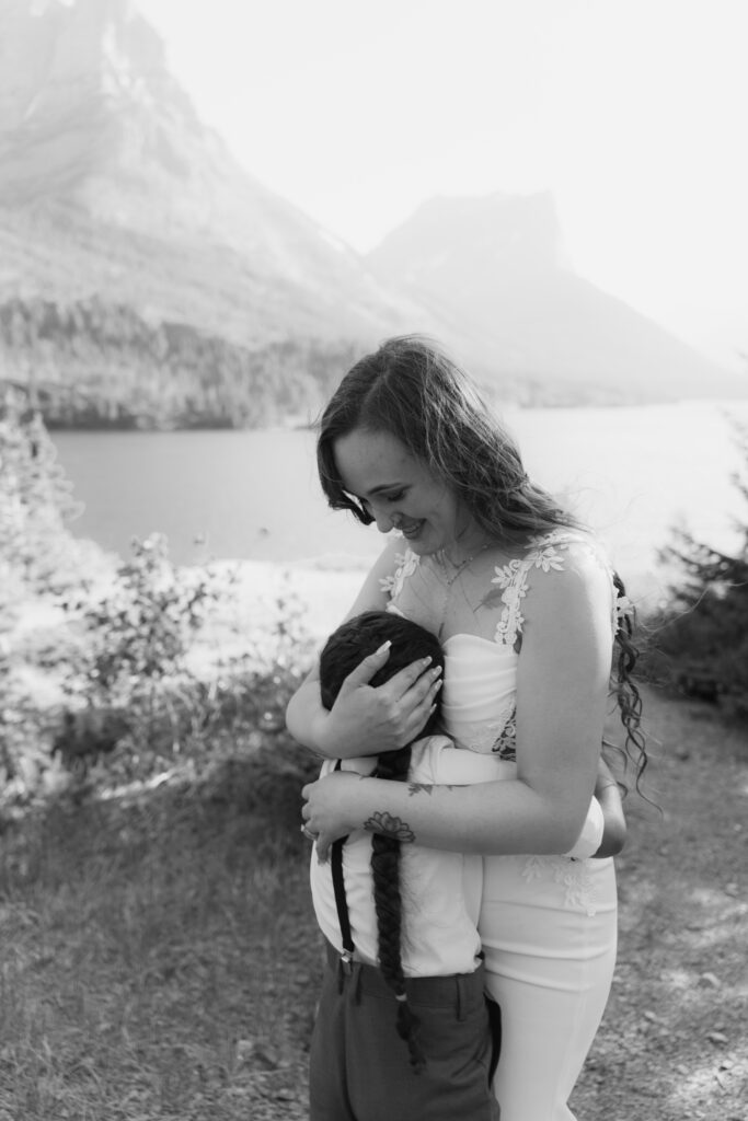 Bree hugs Aiden after eloping in Glacier National Park.