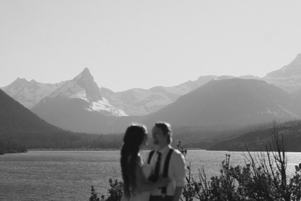 Bride and groom share quiet vows while holding each other at Sun Point.